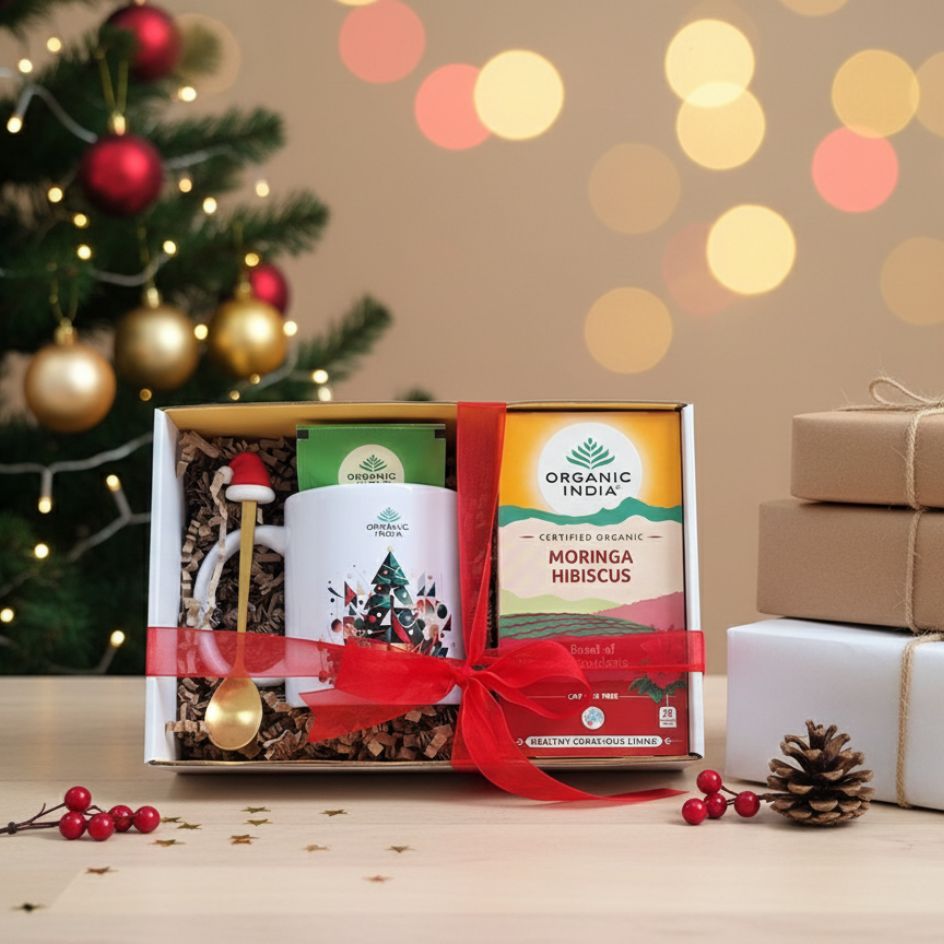 Ritual de Natal Moringa Hibiscus com caneca e colher e arvore de natal presente